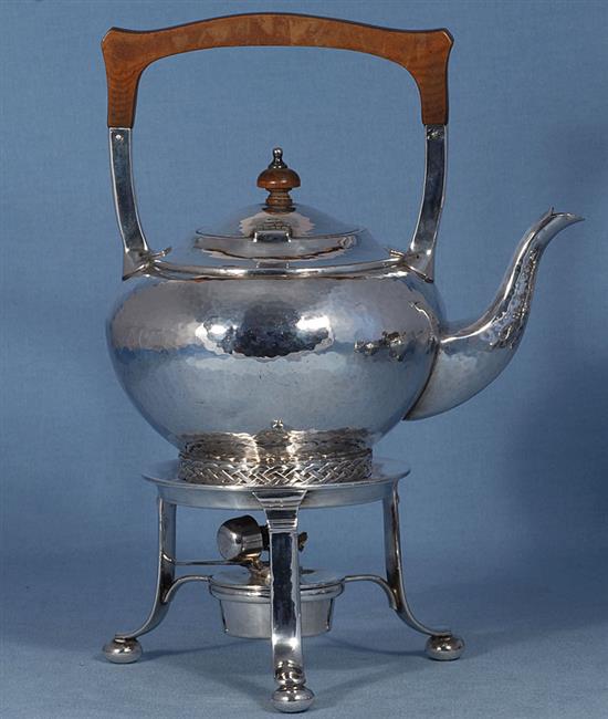 A Georged V silver Arts & Crafts three piece tea set,